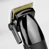A close-up, studio shot of a black and gold hair clipper against a white background. Produktbild-Vorschau