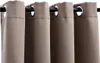 A close-up view of taupe-colored curtains hanging from a black curtain rod. Produktbild-Vorschau