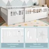 A white wooden bed frame with a safety fence, featuring cut-out star and moon decorations. The image is a collage with close-up views of the fence and decorations. Anteprima dell’immagine prodotto