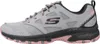 A side view of a gray and pink Skechers trail shoe. Produktbild-Vorschau