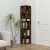 A tall, narrow bookshelf with a wood-like finish is placed in a corner next to a white door. Two potted plants with long, green leaves are positioned to the left of the bookshelf, in front of a white wall and a portion of a white sofa. Podgląd zdjęcia produktu