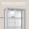 A close-up view of a modern, illuminated glass display cabinet with shelves. Produktbild-Vorschau