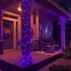 A porch decorated for Halloween with purple string lights, a wreath on the door, and spooky projections. Produktbild-Vorschau