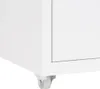 A close-up view of the bottom corner of a white cabinet with a caster wheel. Náhľad obrázku produktu