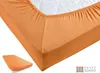 A close-up view of an orange fitted sheet on a mattress, with a smaller inset image of the sheet folded. Produktbild-Vorschau