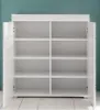 An open white cabinet with multiple shelves against a teal wall. Produktbild-Vorschau