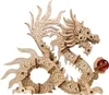 A 3D wooden model of a dragon with a red orb. Anteprima dell’immagine prodotto
