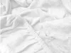 A close-up view of a white terry cloth fitted sheet, showing the elasticized edge. Náhled obrázku produktu