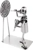 A metal figurine of a dart player aiming at a dartboard, displayed on a metal base. Náhled obrázku produktu