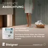 A person is standing in a modern shower with water running, demonstrating a shower seal product. Produktbild-Vorschau