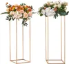 Two gold metal stands with floral arrangements on top, presented against a white background. Produktbild-Vorschau