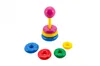 A stacking ring toy with a pink ball on top, yellow pole, and colorful rings. Podgląd zdjęcia produktu