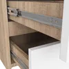 Close-up view of an open drawer in a wooden and white dresser, showing metal drawer slides. Produktbild-Vorschau