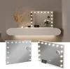 A vanity mirror with LED lights is shown in a lifestyle setting and as separate product shots. Produktbild-Vorschau