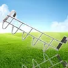 A metal over-the-door hook rack is shown against a background of sky and grass. A reflection of the rack is visible below. Produktbild-Vorschau