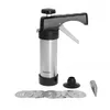 A cookie press with various attachments laid out on a white background. Podgląd zdjęcia produktu