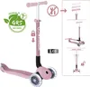 A pink Globber scooter with LED lights on the wheels, shown on a white background with instructional graphics.