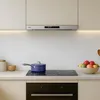 A modern kitchen scene featuring a range hood, stovetop, and a pot. Náhľad obrázku produktu