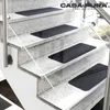 Staircase with anthracite stair mats. Produktbild-Vorschau