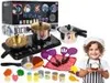 A collection of toy kitchenware and food items, with a child dressed as a chef in the foreground. Produktbild-Vorschau