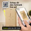 A smartphone is held up to a cardboard wardrobe, showing an AR view of the wardrobe. Produktbild-Vorschau