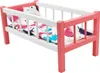 A doll's crib with a colorful patterned bedding. Náhled obrázku produktu