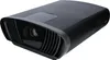 A black projector is shown from a three-quarter angle against a white background. Produktbild-Vorschau