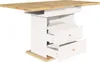 A rectangular dining table with a wooden top and white base with drawers, shown against a white background. Produktbild-Vorschau
