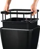 Hands assembling a black planter with a watering indicator. Náhled obrázku produktu