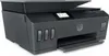 A dark gray HP Smart Tank Plus 655 Wireless AiO A4 color printer is shown from a slightly elevated front-left angle against a white background. Podgląd zdjęcia produktu