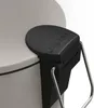 A close-up view of the lid and handle mechanism of a trash can. Anteprima dell’immagine prodotto