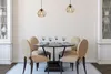 A dining room scene with a table and chairs, set for a meal. Náhľad obrázku produktu