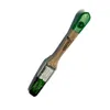 A paintbrush with a green handle and a label on the bristles, isolated on a white background. Produktbild-Vorschau