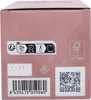 The image shows the side of a pink cardboard box, likely for a perfume or cosmetic product. It features various icons and labels. Náhľad obrázku produktu