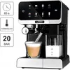 A close-up studio shot of a black and silver automatic coffee machine with a glass of coffee and a milk jug. Produktbild-Vorschau