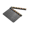 A black and yellow film clapboard is shown against a white background. Náhled obrázku produktu