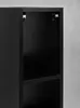 Close-up of the inside corner of a black shelf unit, showing mounting brackets at the top and a shelf below. Náhľad obrázku produktu