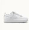 A white Nike Air Force 1 sneaker is shown from the side on a white background. Anteprima dell’immagine prodotto