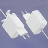Two white power adapters are shown against a light purple background. Produktbild-Vorschau