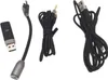 A collection of cables and adapters for a gaming headset, laid out on a white background. Produktbild-Vorschau
