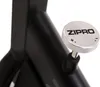 A close-up of a silver adjustment knob on a black metal frame of an exercise bike. Podgląd zdjęcia produktu