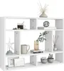 A white modular shelving unit filled with various decorative items. Voir les images du produit
