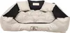 A dog bed with raised sides and two small pillows. Voir les images du produit