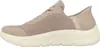 Side view of a beige Skechers slip-on shoe. Anteprima dell’immagine prodotto