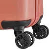 A close-up view of the wheels and bottom corner of a coral-colored suitcase. Produktbild-Vorschau