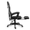 A side view of a black and gray gaming chair with an extended footrest. Náhled obrázku produktu