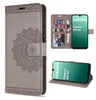 A collage of images showing a grey flip wallet phone case with a mandala design, and a Samsung Galaxy A16 5G phone inside the case. Produktbild-Vorschau
