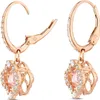 A pair of rose gold drop earrings with pink stones and clear crystals. Anteprima dell’immagine prodotto