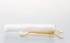 A product shot of a clear plastic case with gold metal prongs, set against a light gray and white background. Produktbild-Vorschau