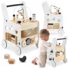 A baby is playing with a wooden walker and activity center. Produktbild-Vorschau